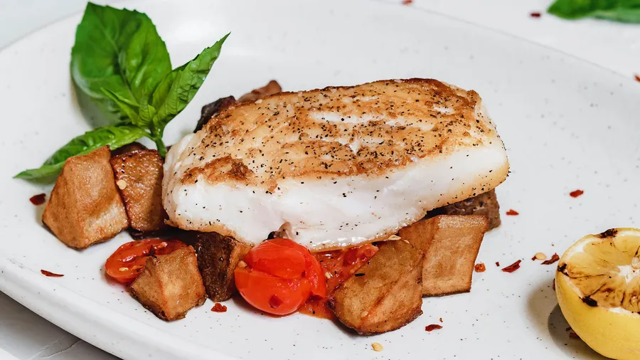 Pan Seared Sea Bass at Malbec Grill, Argentinian steakhouse in Parkland FL