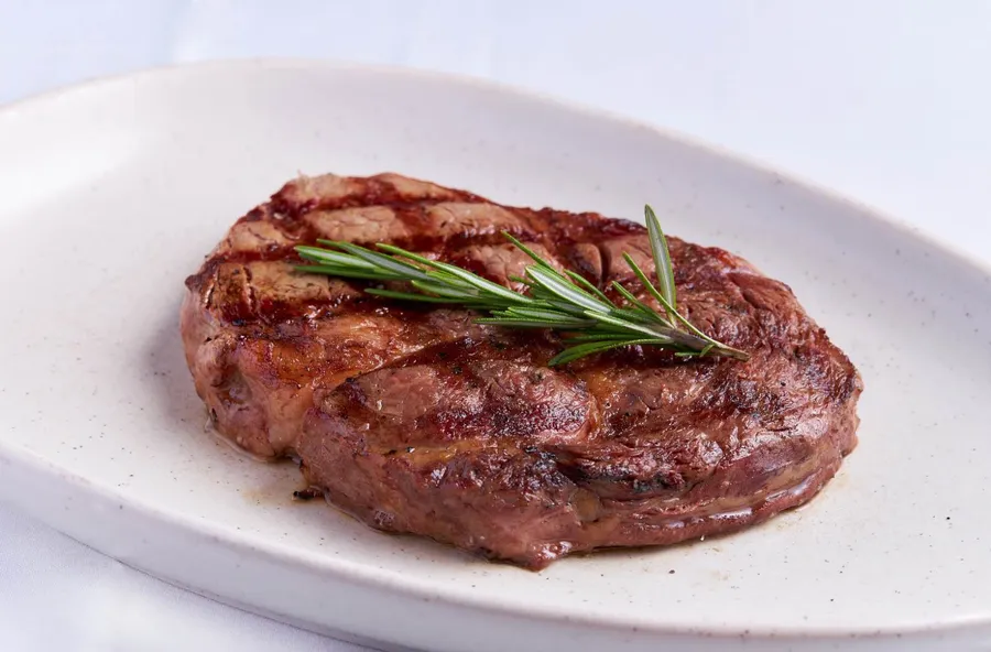 Ribeye grilled over the parrilla at Malbec Grill